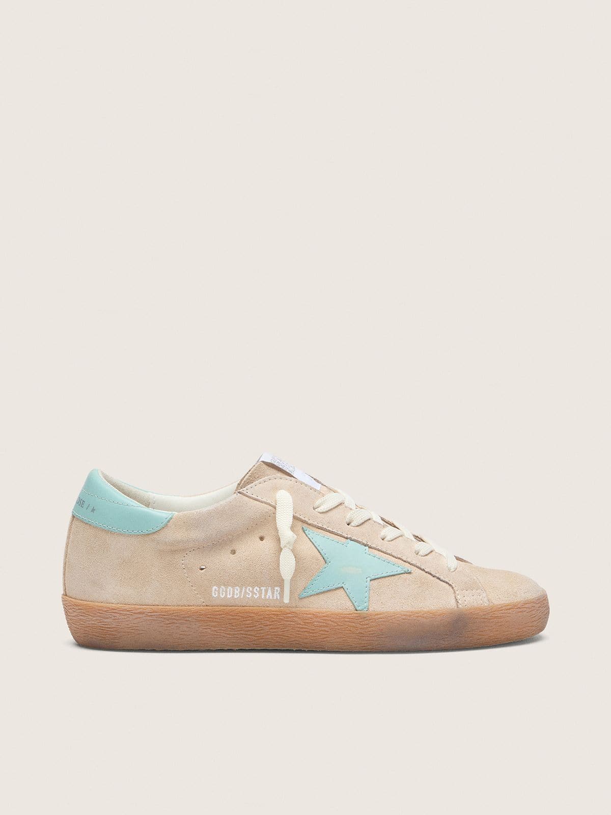 dd38676ea2e240225c45665f4d33c357d0cb2063ca1ffcb426015980003e1b35 Women's Super-Star in beige suede with aqua-green star - Image 1