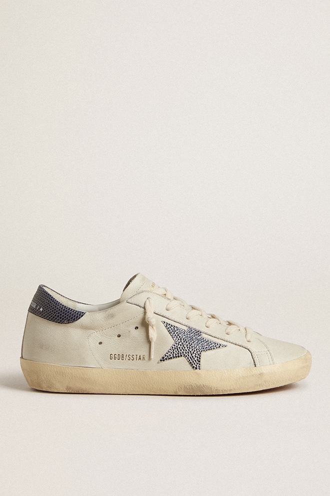 de00574645c1d7997b617dddf9a28a1d014f0caca2e718529ecc7c0d5a296e0f Super-Star with cream-colored leather star with Swarovski crystals and blue leather heel tab with lizard print - Image 1