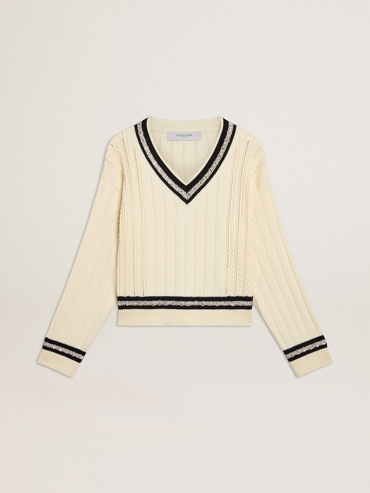 de5842c18170619ce4cd321e229adca456c99e8a1b852637b3d689c1dbd8f127 Women's cable-pattern cropped sweater with blue ribbing and crystals - Image 1