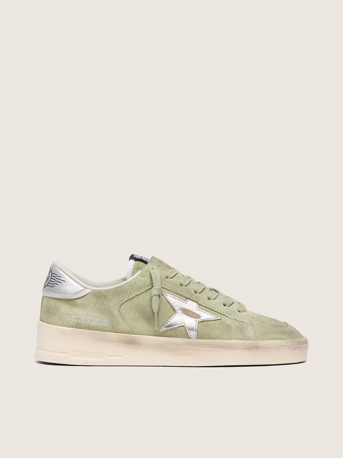 df82a9b82a405d4faa90af17adb142c59eff7c94768f746c994c266e3868c355 Women's Stardan in sage-green suede with metallic silver star - Image 1