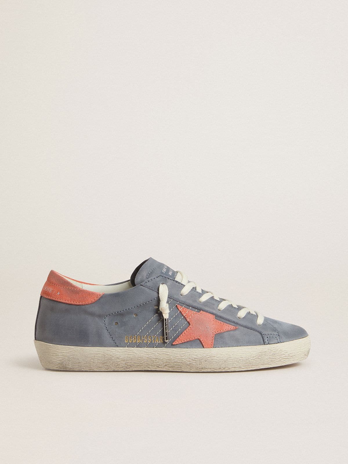 e1a7226921834e88581465f6e462f476d8991ba0358a984ea6a82f4f4c8ed8f0 Women's Super Star in blue nubuck with pink suede star and heel tab - Image 1