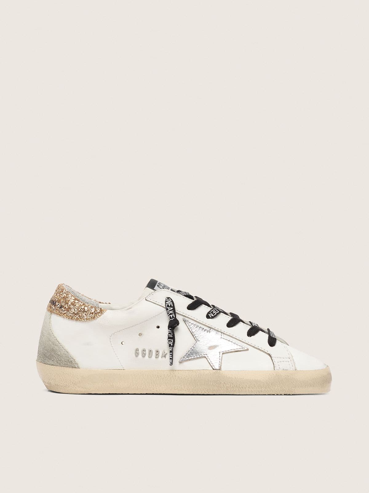e643a7ba1a00f94211e456e225c318ce879220529d7c2a011355986b2da88372 Women's white leather Super-Star with glittery heel tab - Image 1