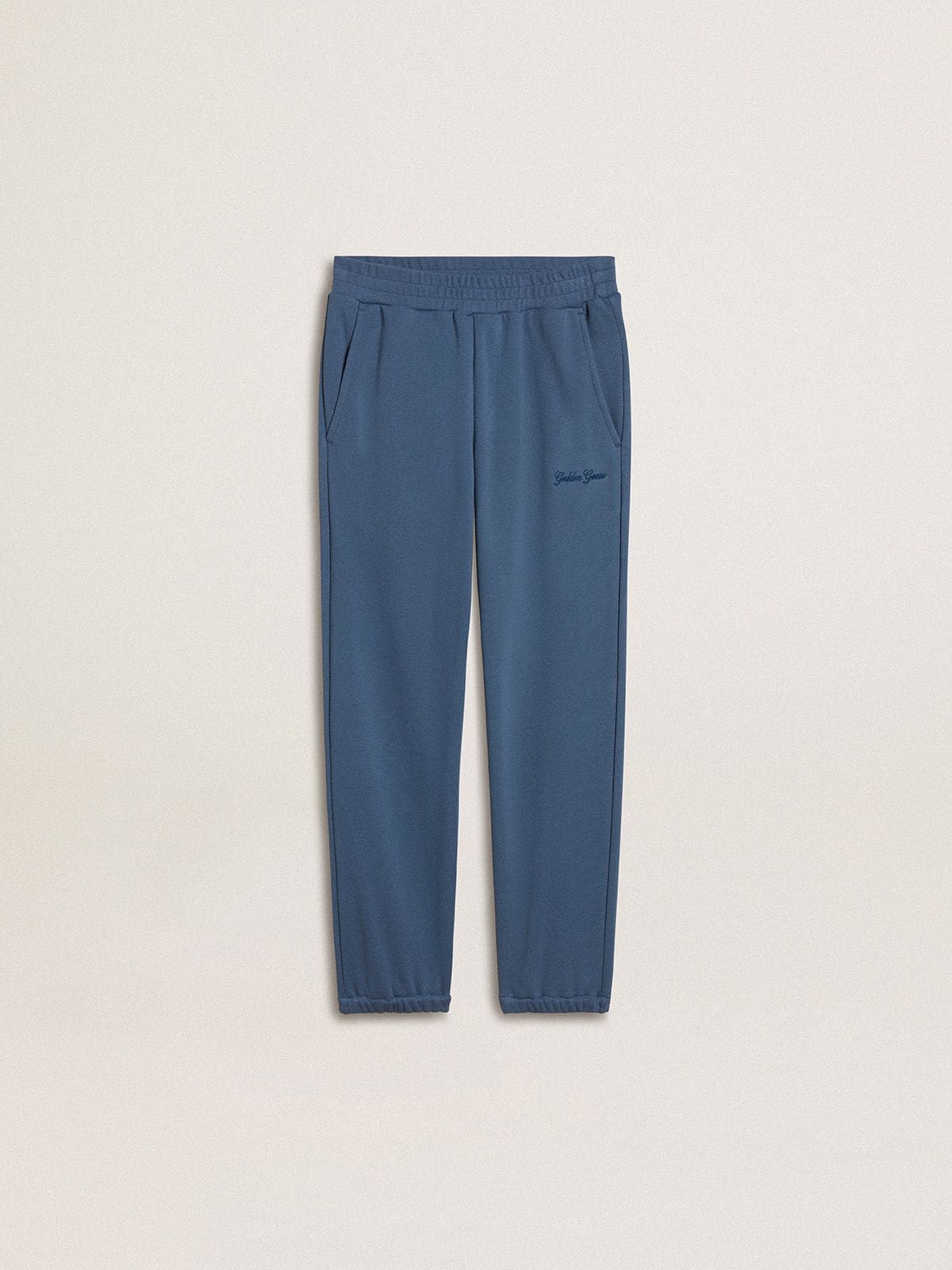 e9fc98f0a7d5abd1bbbef84d586d47417a666bdd9de88507799a9a8510847add Kids' blue joggers with embroidery - Image 1