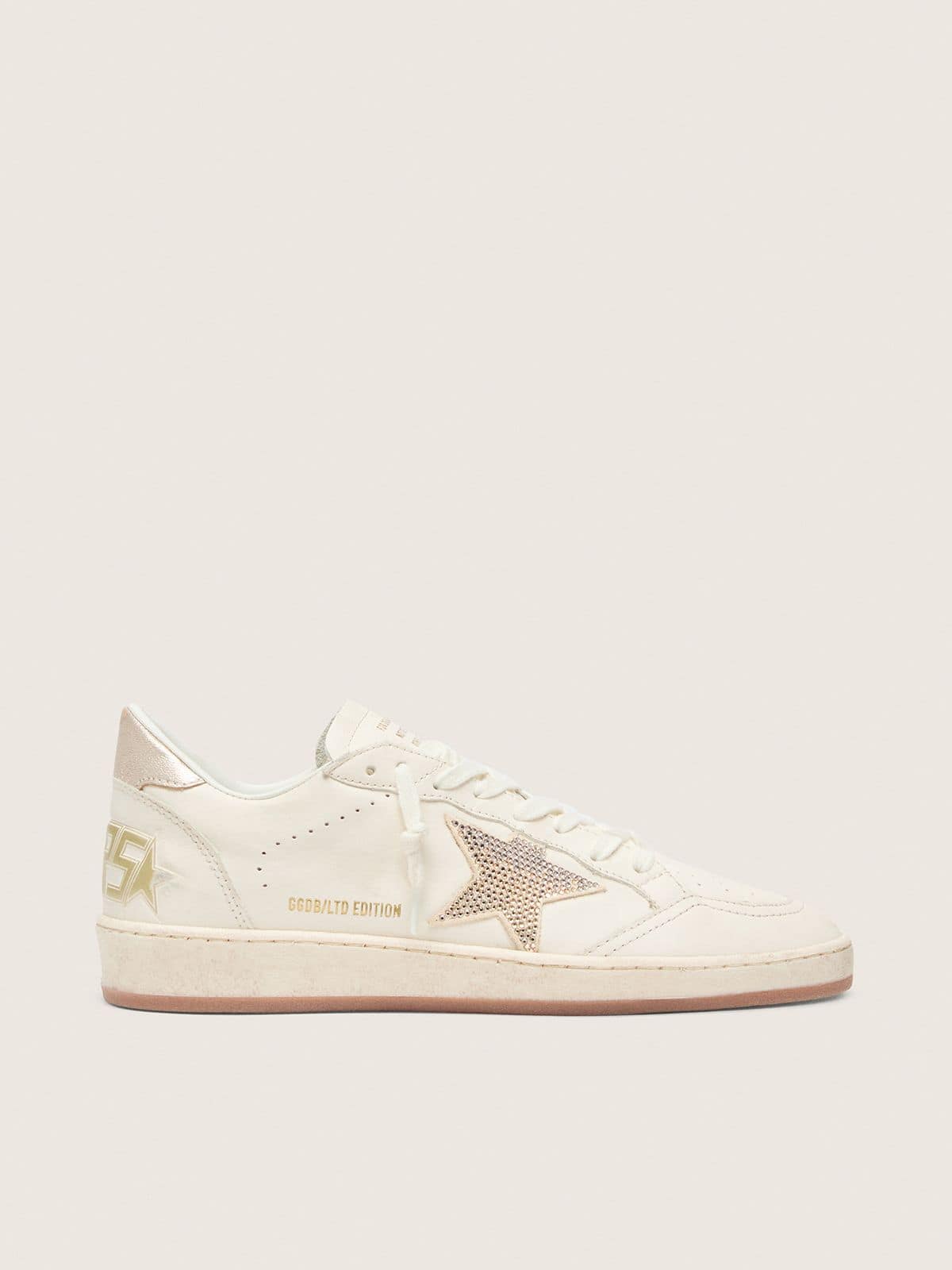 ea0a2908ff27a48d7080f7ba5632a5db6560352c1c9478ae5ae1ce32c2e95018 Women's Ball Star in white leather with crystal star and metallic heel tab - Image 1