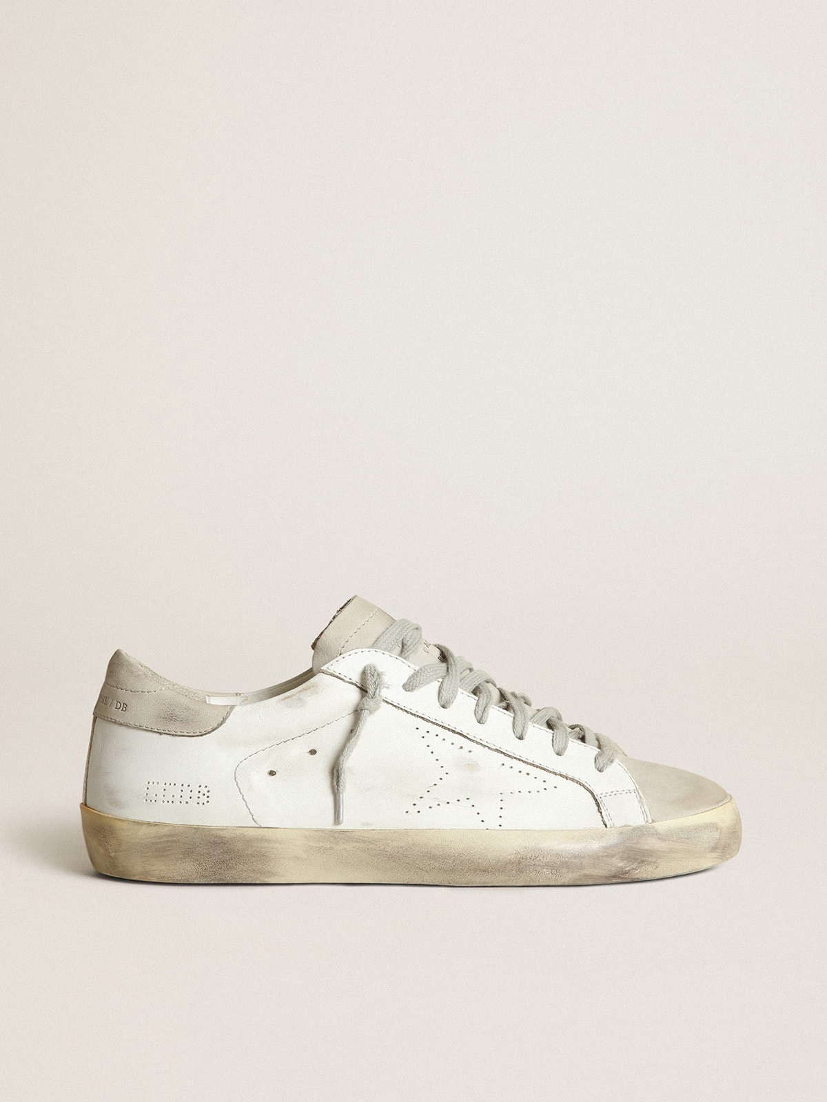 ec71c2c884e4d7879b24dfb3a2b3d9835848f45a83e2ef7b8dc212c3645b97d8 Men's Super-Star with perforated star and ice-gray heel tab - Image 1