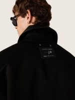Men's short padded jacket in black cotton with leather collar - Image 4