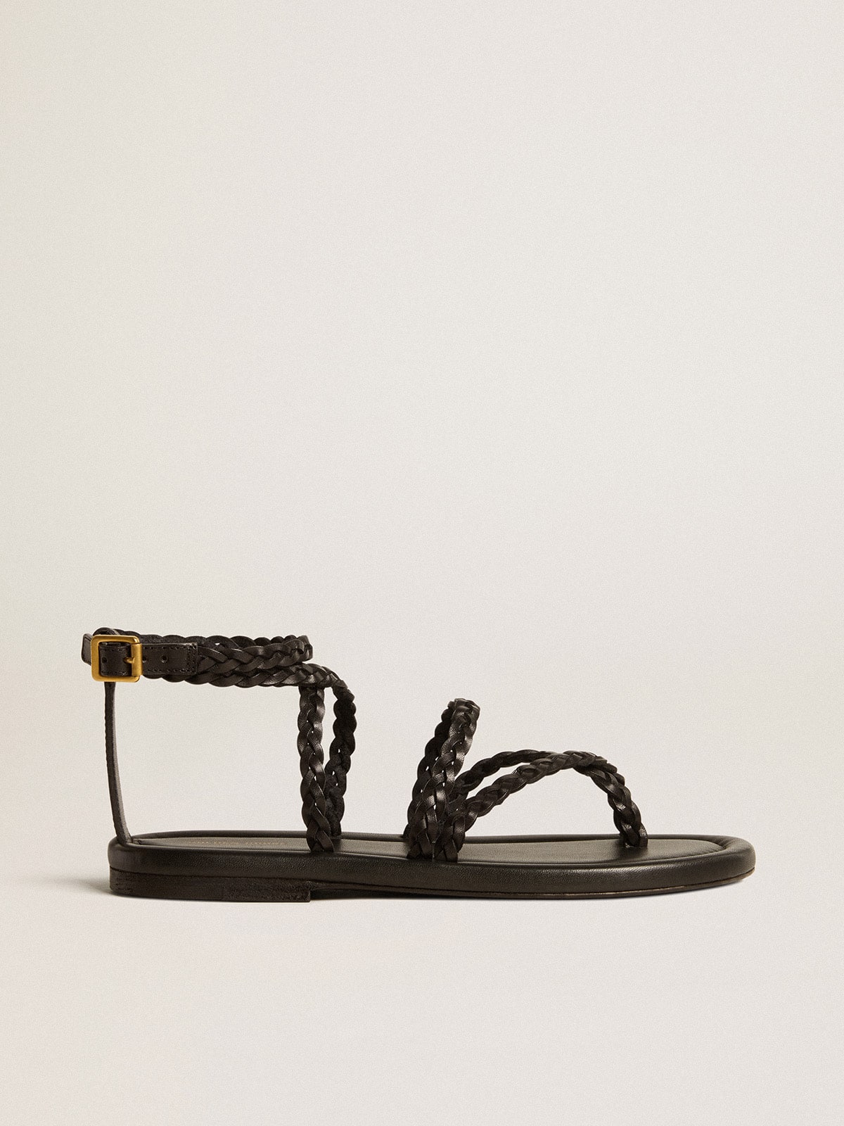 f6ffb5096c52d2724e949d848d7273b2f50a419e715e61bbafe2c0ec77520cd8 Women's Penelope flat sandals in black leather - Image 1