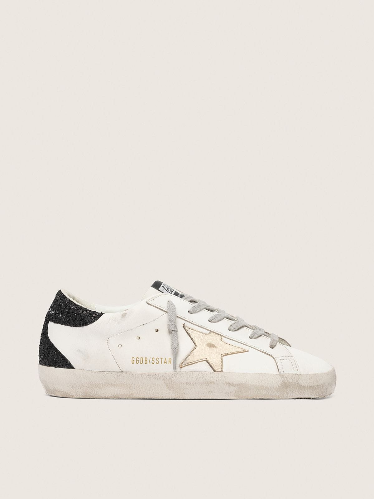 fcbfe074ca804332002443f4c433edb1afbaca5a6a9af9b321b92d071f25f8f3 Women's Super-Star with gold star and black glitter heel tab - Image 1